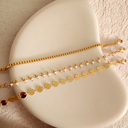 Disc, Chain, and Delicate Bracelet Trio	