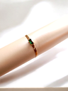 Emerald Pendant and Chain Bracelet Trio	