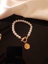 Pearl Pendant and Thick Chain Bracelet Duo	