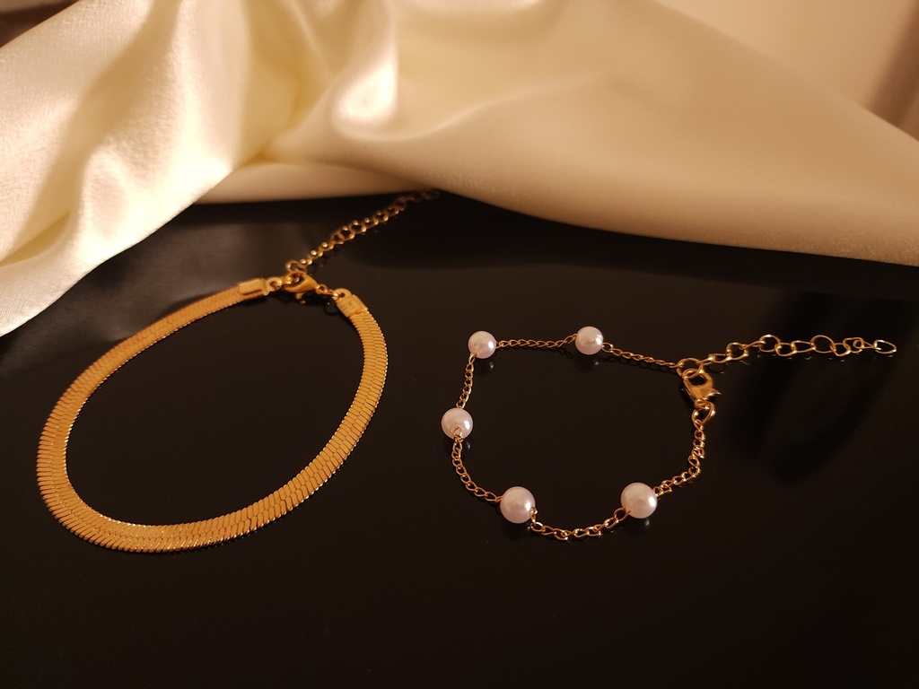 Elegant Gold and Pearl Bracelet Set - Four-Piece Collection