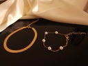 Elegant Gold and Pearl Bracelet Set - Four-Piece Collection