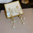 Delicate Pearl Bow-Shaped Tassel Earrings