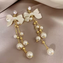 Delicate Pearl Bow-Shaped Tassel Earrings