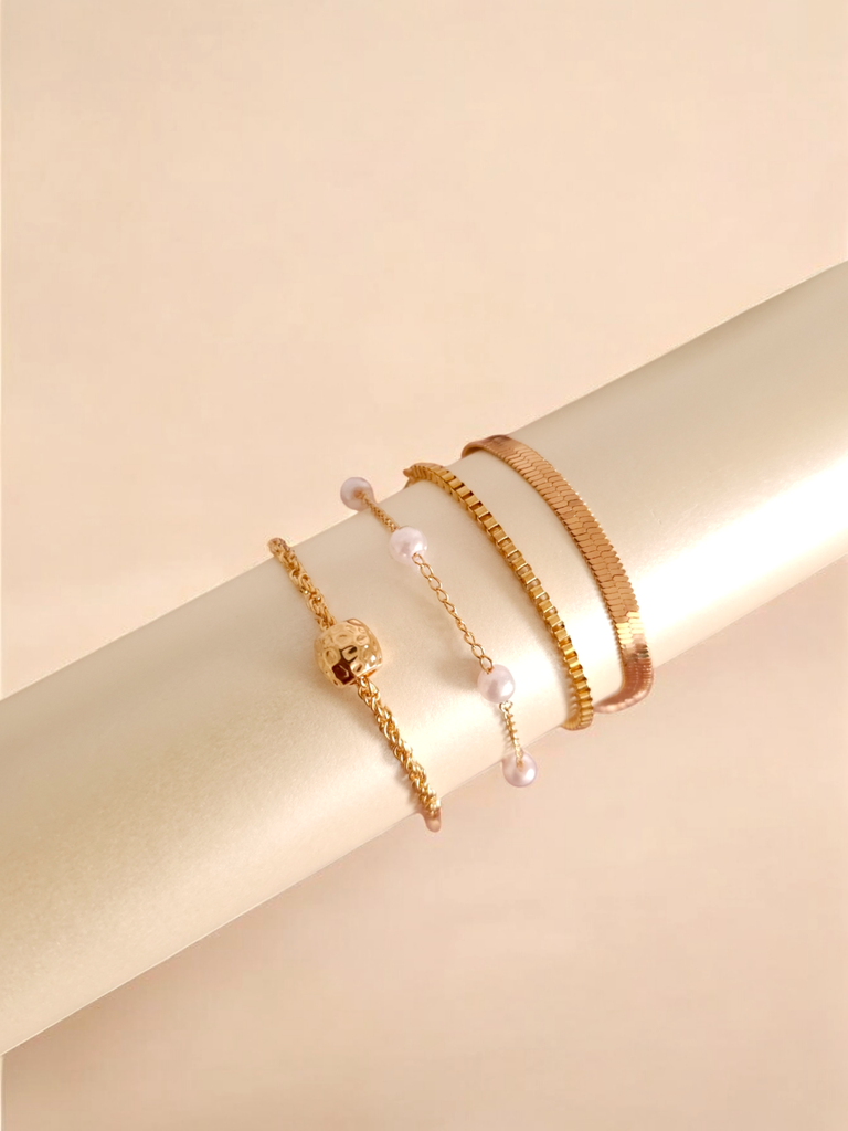 Elegant Gold and Pearl Bracelet Set - Four-Piece Collection