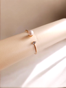 Radiant Sophistication: Pearl & Rhinestone Open-End Bangle